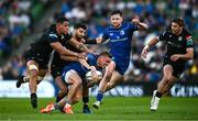 17 May 2025; Fintan Gunne of Leinster is tackled by Macenzzie Duncan, left, and Ben Afshar of Glasgow Warriors during the United Rugby Championship match between Leinster and Glasgow Warriors at the Aviva Stadium in Dublin. Photo by Ramsey Cardy/Sportsfile