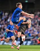 17 May 2025; Adam Hastings of Glasgow Warriors claims a high ball ahead of Jordie Barrett of Leinster during the United Rugby Championship match between Leinster and Glasgow Warriors at the Aviva Stadium in Dublin. Photo by Sam Barnes/Sportsfile