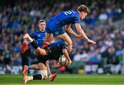 17 May 2025; Adam Hastings of Glasgow Warriors claims a high ball ahead of Jordie Barrett of Leinster during the United Rugby Championship match between Leinster and Glasgow Warriors at the Aviva Stadium in Dublin. Photo by Sam Barnes/Sportsfile