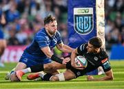 17 May 2025; Adam Hastings of Glasgow Warriors in action against Hugo Keenan of Leinster during the United Rugby Championship match between Leinster and Glasgow Warriors at the Aviva Stadium in Dublin. Photo by Sam Barnes/Sportsfile