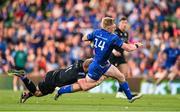 17 May 2025; Tommy O'Brien of Leinster is tackled by Kyle Steyn of Glasgow Warriors during the United Rugby Championship match between Leinster and Glasgow Warriors at the Aviva Stadium in Dublin. Photo by Ramsey Cardy/Sportsfile