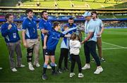 17 May 2025; James Lowe and his Leinster teammates are presented with the Irish Shield by Billy Lacey, James Sherry and Lana Hill, representing OLSC charity Partner, Neurodiversity Ireland, during the United Rugby Championship match between Leinster and Glasgow Warriors at the Aviva Stadium in Dublin. Photo by Ramsey Cardy/Sportsfile