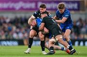 17 May 2025; Jamie Osborne of Leinster is tackled by Rory Darge and Euan Ferrie of Glasgow Warriors during the United Rugby Championship match between Leinster and Glasgow Warriors at the Aviva Stadium in Dublin. Photo by Ramsey Cardy/Sportsfile