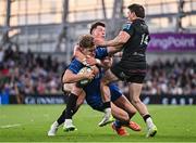 17 May 2025; Jordie Barrett of Leinster is tackled by Huw Jones, left, and Sebastian Cancelliere of Glasgow Warriors during the United Rugby Championship match between Leinster and Glasgow Warriors at the Aviva Stadium in Dublin. Photo by Sam Barnes/Sportsfile