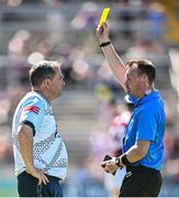 17 May 2025; Antrim manager Davy Fitzgerald is shown the yellow card by referee Thomas Gleeson during the Leinster GAA Hurling Senior Championship Round 4 match between Galway and Antrim at Pearse Stadium in Galway. Photo by Piaras Ó Mídheach/Sportsfile
