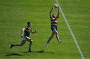 17 May 2025; Eddie Nolan of Roscommon gathers possession from a kickout ahead of Diarmuid O'Connor of Kerry during the GAA Football All-Ireland Senior Championship Round 1 match between Kerry and Roscommon at Fitzgerald Stadium in Killarney, Kerry. Photo by Brendan Moran/Sportsfile
