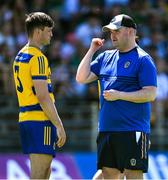 17 May 2025; Roscommon manager Davy Burke speaks to team captain Brian Stack before the GAA Football All-Ireland Senior Championship Round 1 match between Kerry and Roscommon at Fitzgerald Stadium in Killarney, Kerry. Photo by Brendan Moran/Sportsfile