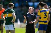 17 May 2025; Referee David Coldrick performs the coin toss in the company of team captains Gavin White of Kerry and Brian Stack of Roscommon before the GAA Football All-Ireland Senior Championship Round 1 match between Kerry and Roscommon at Fitzgerald Stadium in Killarney, Kerry. Photo by Brendan Moran/Sportsfile
