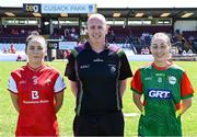 18 May 2025; Referee Paul McCaughey with Louth captain Áine Breen, left, and Carlow captain Róisín Bailey before the TG4 Leinster LGFA Junior Championship final match between Carlow and Louth at TEG Cusack Park in Mullingar, Westmeath. Photo by Seb Daly/Sportsfile
