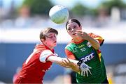 18 May 2025; Bronagh Nolan of Carlow in action against Louise Byrne of Louth during the TG4 Leinster LGFA Junior Championship final match between Carlow and Louth at TEG Cusack Park in Mullingar, Westmeath. Photo by Seb Daly/Sportsfile