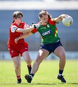 18 May 2025; Clíodhna Ní Shé of Carlow in action against Louise Byrne of Louth during the TG4 Leinster LGFA Junior Championship final match between Carlow and Louth at TEG Cusack Park in Mullingar, Westmeath. Photo by Seb Daly/Sportsfile