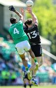 18 May 2025; Alan McLoughlin of Sligo in action against Leitrim players Kieran Clancy and James Rooney, obstructed, during the Táilteann Cup match between Leitrim and Sligo at Avant Money Páirc Seán Mac Diarmada in Carrick-on-Shannon, Leitrim. Photo by Thomas Flinkow/Sportsfile