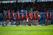 18 May 2025; Down players stand for the playing of the Amhrán na bhFiann before the GAA Football All-Ireland Senior Championship Round 1 match between Clare and Down at Zimmer Biomet Páirc Chíosóg in Ennis, Clare. Photo by Tom Beary/Sportsfile