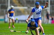 18 May 2025; John McGrath of Tipperary is tackled by Conor Prunty of Waterford during the Munster GAA Hurling Senior Championship Round 4 match between Tipperary and Waterford at FBD Semple Stadium in Thurles, Tipperary. Photo by Tyler Miller/Sportsfile