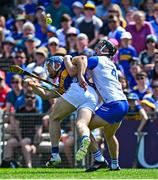 18 May 2025; John McGrath of Tipperary in action against Iarlaith Daly of Waterford during the Munster GAA Hurling Senior Championship Round 4 match between Tipperary and Waterford at FBD Semple Stadium in Thurles, Tipperary. Photo by Tyler Miller/Sportsfile