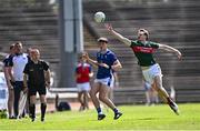 18 May 2025; Matthew Ruane of Mayo in action against Evan Crowe of Cavan during the GAA Football All-Ireland Senior Championship Round 1 match between Mayo and Cavan at Hastings Insurance MacHale Park in Castlebar, Mayo. Photo by Piaras Ó Mídheach/Sportsfile