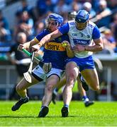 18 May 2025; John McGrath of Tipperary in action against Conor Prunty of Waterford during the Munster GAA Hurling Senior Championship Round 4 match between Tipperary and Waterford at FBD Semple Stadium in Thurles, Tipperary. Photo by Tyler Miller/Sportsfile