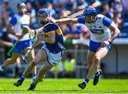 18 May 2025; John McGrath of Tipperary in action against Conor Prunty of Waterford during the Munster GAA Hurling Senior Championship Round 4 match between Tipperary and Waterford at FBD Semple Stadium in Thurles, Tipperary. Photo by Tyler Miller/Sportsfile