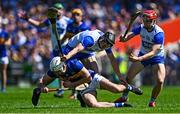 18 May 2025; Craig Morgan of Tipperary is tackled by Jamie Barron of Waterford during the Munster GAA Hurling Senior Championship Round 4 match between Tipperary and Waterford at FBD Semple Stadium in Thurles, Tipperary. Photo by Tyler Miller/Sportsfile