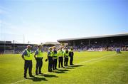 18 May 2025; Serving members of An Garda Síochána stand for a minute's silence in memory of the late Kevin Flatley, before the Leinster GAA Hurling Senior Championship Round 4 match between Kilkenny and Dublin at UPMC Nowlan Park in Kilkenny. Photo by Ramsey Cardy/Sportsfile