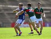 18 May 2025; Dara McVeety of Cavan in action against Jack Coyne of Mayo during the GAA Football All-Ireland Senior Championship Round 1 match between Mayo and Cavan at Hastings Insurance MacHale Park in Castlebar, Mayo. Photo by Piaras Ó Mídheach/Sportsfile