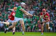 18 May 2025; Aaron Gillane of Limerick scores his side's first goal despite the efforts of Niall O'Leary, left, and Ciarán Joyce of Cork during the Munster GAA Hurling Senior Championship Round 4 match between Limerick and Cork at TUS Gaelic Grounds in Limerick. Photo by Sam Barnes/Sportsfile