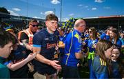 18 May 2025; Tipperary goalkeeper Rhys Shelly is guided off the pitch by a security guard after the Munster GAA Hurling Senior Championship Round 4 match between Tipperary and Waterford at FBD Semple Stadium in Thurles, Tipperary. Photo by Tyler Miller/Sportsfile