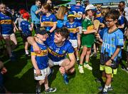 18 May 2025; Conor Stakelum of Tipperary poses for a photograph with Tipperary supporter Joey Moss after the Munster GAA Hurling Senior Championship Round 4 match between Tipperary and Waterford at FBD Semple Stadium in Thurles, Tipperary. Photo by Tyler Miller/Sportsfile