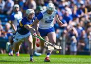 18 May 2025; Shane Bennett of Waterford in action against Bryan O'Mara of Tipperary during the Munster GAA Hurling Senior Championship Round 4 match between Tipperary and Waterford at FBD Semple Stadium in Thurles, Tipperary. Photo by Tyler Miller/Sportsfile