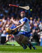 18 May 2025; Jake Morris of Tipperary is tackled by Tadhg de Búrca of Waterford during the Munster GAA Hurling Senior Championship Round 4 match between Tipperary and Waterford at FBD Semple Stadium in Thurles, Tipperary. Photo by Ray McManus/Sportsfile