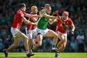 18 May 2025; Barry Nash of Limerick in action against Cork players, from left, Eoin Downey, Declan Dalton and Ciarán Joyce during the Munster GAA Hurling Senior Championship Round 4 match between Limerick and Cork at TUS Gaelic Grounds in Limerick. Photo by Sam Barnes/Sportsfile