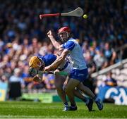 18 May 2025; Jake Morris of Tipperary is tackled by Tadhg de Burca of Waterford during the Munster GAA Hurling Senior Championship Round 4 match between Tipperary and Waterford at FBD Semple Stadium in Thurles, Tipperary. Photo by Ray McManus/Sportsfile