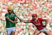 18 May 2025; Tom Morrissey of Limerick in action against Ciarán Joyce of Cork during the Munster GAA Hurling Senior Championship Round 4 match between Limerick and Cork at TUS Gaelic Grounds in Limerick. Photo by Sam Barnes/Sportsfile