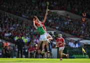 18 May 2025; Barry Nash of Limerick and Brian Hayes of Cork contest a dropping ball during the Munster GAA Hurling Senior Championship Round 4 match between Limerick and Cork at TUS Gaelic Grounds in Limerick. Photo by Brendan Moran/Sportsfile