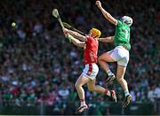 18 May 2025; Niall O'Leary of Cork in action against Aaron Gillane of Limerick during the Munster GAA Hurling Senior Championship Round 4 match between Limerick and Cork at TUS Gaelic Grounds in Limerick. Photo by Sam Barnes/Sportsfile