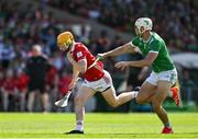 18 May 2025; Shane Barrett of Corkis tackled by Kyle Hayes of Limerick during the Munster GAA Hurling Senior Championship Round 4 match between Limerick and Cork at TUS Gaelic Grounds in Limerick. Photo by Brendan Moran/Sportsfile