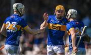 18 May 2025; Darragh McCarthy, 20, celebrates with Sean Kenneally and goalscorer Oisin O'Donoghue of Tipperary, left, during the Munster GAA Hurling Senior Championship Round 4 match between Tipperary and Waterford at FBD Semple Stadium in Thurles, Tipperary. Photo by Ray McManus/Sportsfile