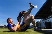 18 May 2025; Diarmuid O'Donnell of Clare does a stretching routine before the GAA Football All-Ireland Senior Championship Round 1 match between Clare and Down at Zimmer Biomet Páirc Chíosóg in Ennis, Clare. Photo by Tom Beary/Sportsfile