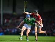 18 May 2025; Shane O'Brien of Limerick in action against Eoin Downey of Cork during the Munster GAA Hurling Senior Championship Round 4 match between Limerick and Cork at TUS Gaelic Grounds in Limerick. Photo by Sam Barnes/Sportsfile