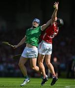 18 May 2025; Shane O'Brien of Limerick in action against Eoin Downey of Cork during the Munster GAA Hurling Senior Championship Round 4 match between Limerick and Cork at TUS Gaelic Grounds in Limerick. Photo by Sam Barnes/Sportsfile