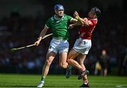 18 May 2025; Shane O'Brien of Limerick in action against Eoin Downey of Cork during the Munster GAA Hurling Senior Championship Round 4 match between Limerick and Cork at TUS Gaelic Grounds in Limerick. Photo by Sam Barnes/Sportsfile