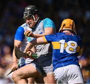 18 May 2025; Waterford goalkeeper Billy Nolan is tackled by Sean Kenneally of Tipperary during the Munster GAA Hurling Senior Championship Round 4 match between Tipperary and Waterford at FBD Semple Stadium in Thurles, Tipperary. Photo by Ray McManus/Sportsfile