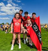 18 May 2025; Down players, from left, John McGeough, James Guinness and Daniel Guinness with supporters Caoimhe McLernon and Ambrose Bradley after the GAA Football All-Ireland Senior Championship Round 1 match between Clare and Down at Zimmer Biomet Páirc Chíosóg in Ennis, Clare. Photo by Tom Beary/Sportsfile