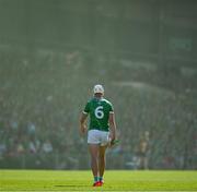 18 May 2025; Kyle Hayes of Limerick as green smoke from a flare in the crowd crosses the pitch during the Munster GAA Hurling Senior Championship Round 4 match between Limerick and Cork at TUS Gaelic Grounds in Limerick. Photo by Brendan Moran/Sportsfile