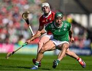 18 May 2025; Sean Finn of Limerick in action against Patrick Horgan of Cork during the Munster GAA Hurling Senior Championship Round 4 match between Limerick and Cork at TUS Gaelic Grounds in Limerick. Photo by Sam Barnes/Sportsfile