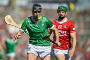 18 May 2025; Diarmaid Byrnes of Limerick in action against Séamus Harnedy of Cork during the Munster GAA Hurling Senior Championship Round 4 match between Limerick and Cork at TUS Gaelic Grounds in Limerick. Photo by Sam Barnes/Sportsfile
