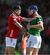 18 May 2025; Eoin Downey of Cork and Shane O'Brien of Limerick tussle during the Munster GAA Hurling Senior Championship Round 4 match between Limerick and Cork at TUS Gaelic Grounds in Limerick. Photo by Brendan Moran/Sportsfile