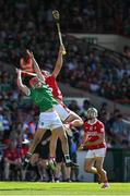 18 May 2025; Barry Nash of Limerick and Brian Hayes of Cork contest a dropping ball during the Munster GAA Hurling Senior Championship Round 4 match between Limerick and Cork at TUS Gaelic Grounds in Limerick. Photo by Brendan Moran/Sportsfile