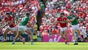 18 May 2025; Mark Coleman of Cork is tackled by William O'Donoghue of Limerick during the Munster GAA Hurling Senior Championship Round 4 match between Limerick and Cork at TUS Gaelic Grounds in Limerick. Photo by Brendan Moran/Sportsfile