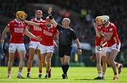 18 May 2025; Cork players protest to referee Liam Gordon after a foul on teammate Alan Connolly during the Munster GAA Hurling Senior Championship Round 4 match between Limerick and Cork at TUS Gaelic Grounds in Limerick. Photo by Brendan Moran/Sportsfile